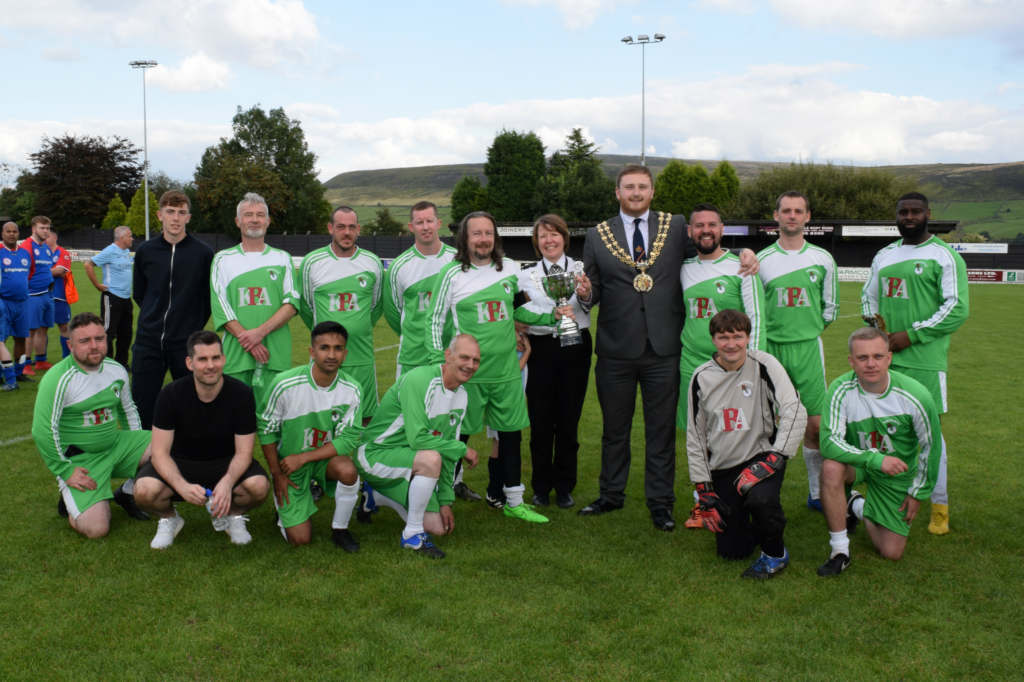 The-Emmaus-Mossley-team-with-the-winners-trophy-image