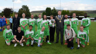The-Emmaus-Mossley-team-with-the-winners-trophy-image